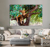 Lioness on a Branch Canvas Print