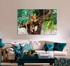 Lioness on a Branch Canvas Print