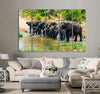 Elephants on a Flooded Ground Canvas Print