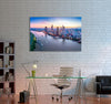 Skyscrapers along River Canvas Print