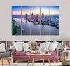 Skyscrapers along River Canvas Print